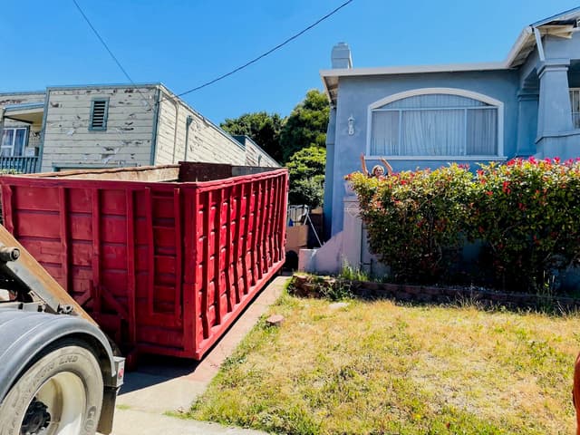 Household cleanout dumpster at home